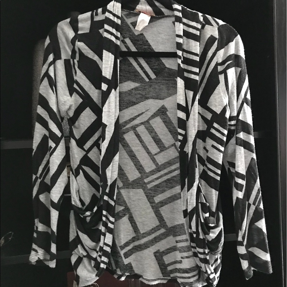 Black and grey geometric sweater shrug